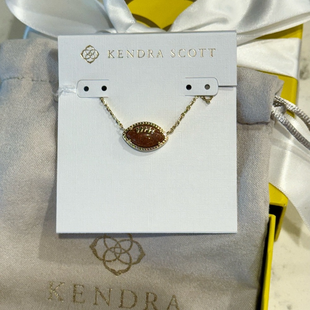 Kendra Scott Gold Necklace with Brown Football Pendant
